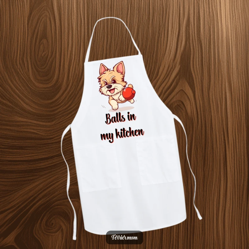 Funny apron featuring a scruffy dog with alert ears excitedly chasing a round red object.