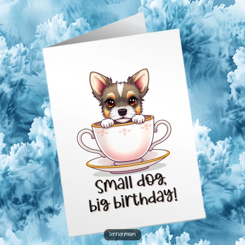 Funny free printable birthday card featuring a terrier with bright eyes peeking out of a tiny teacup. Adorable and humorous.