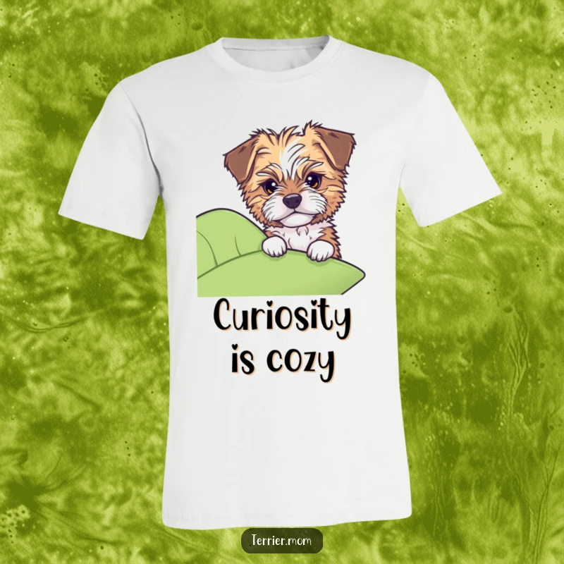 Funny t-shirt depicting a tousled dog with alert ears playfully peeking with curiosity from behind a large leaf.