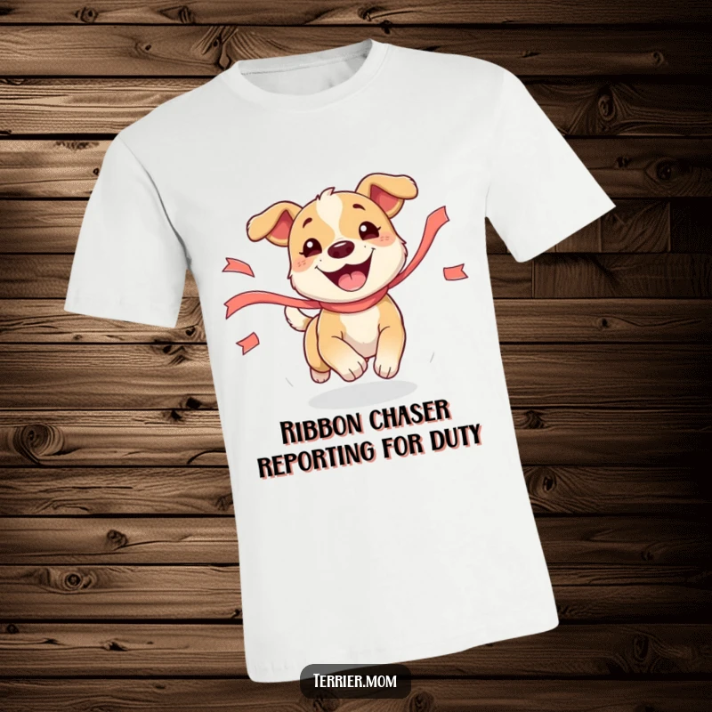Funny Dog T-Shirt depicting a lively, ecstatic dog mid-leap, playfully pursuing a wispy, colorful ribbon with a huge grin.
